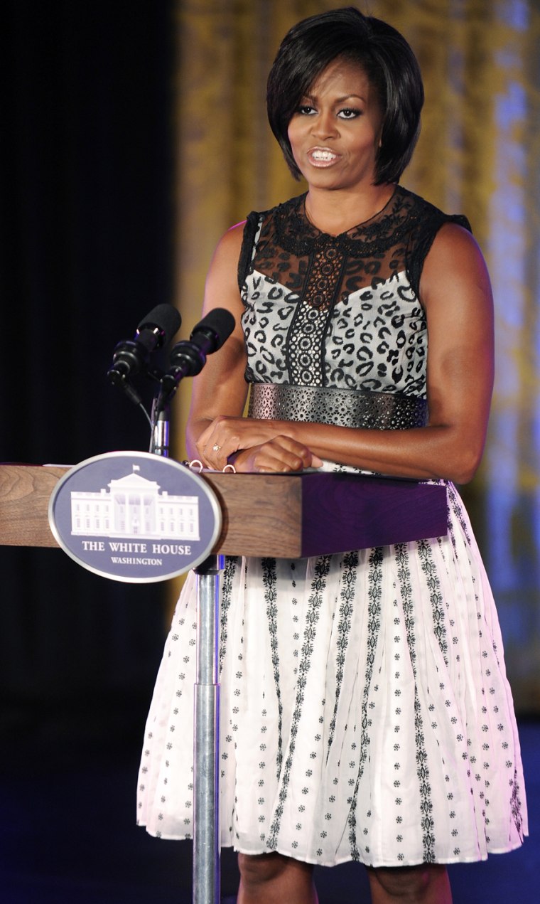 Image: Michelle Obama welcomes the audience to a dance tribute to Alvin Ailey American Dance Theater Artistic Director Judith Jamison in the East Room of the White House in Washington